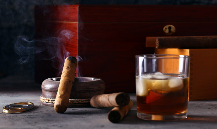 still life with cigars and alcohol men's history